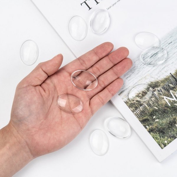 10 ovala cabochoner 25 x 35 mm i klart glas N&deg;20