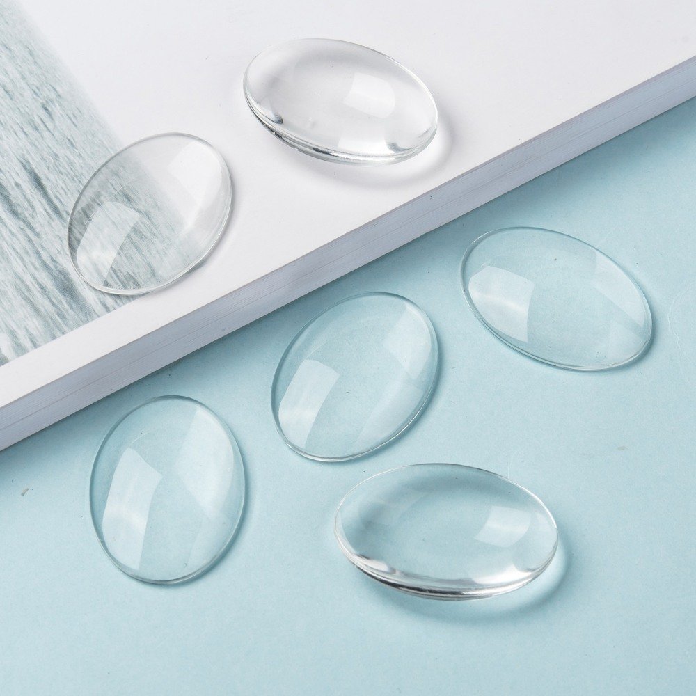 10 ovala cabochoner 25 x 35 mm i klart glas N°20