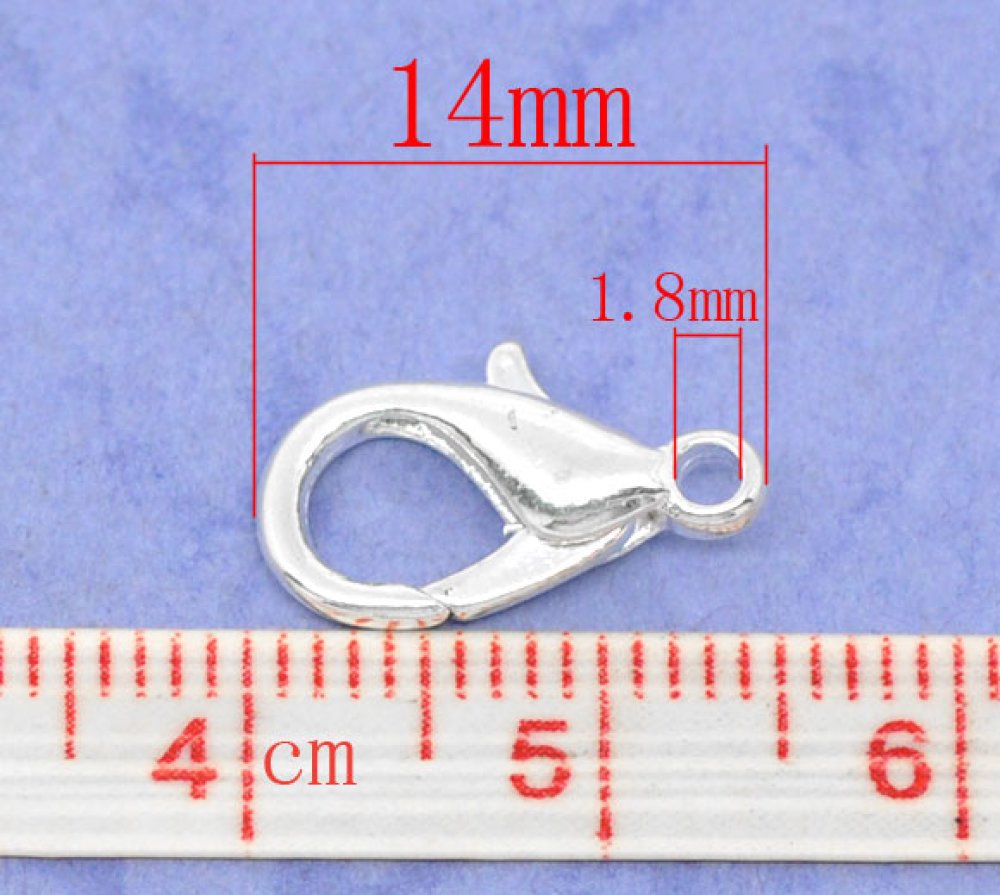 10 karbinhakarspännen 14 x 08 mm.