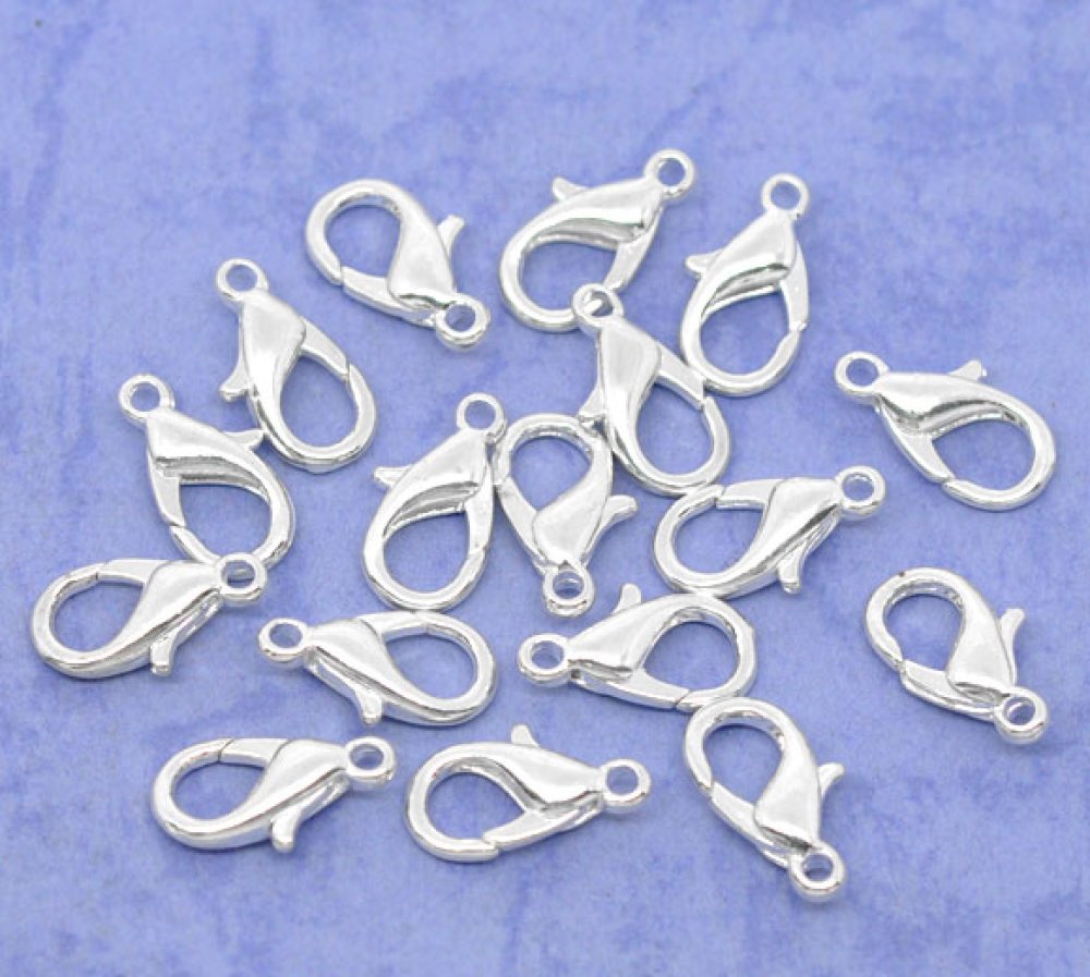 10 karbinhakarspännen 14 x 08 mm.