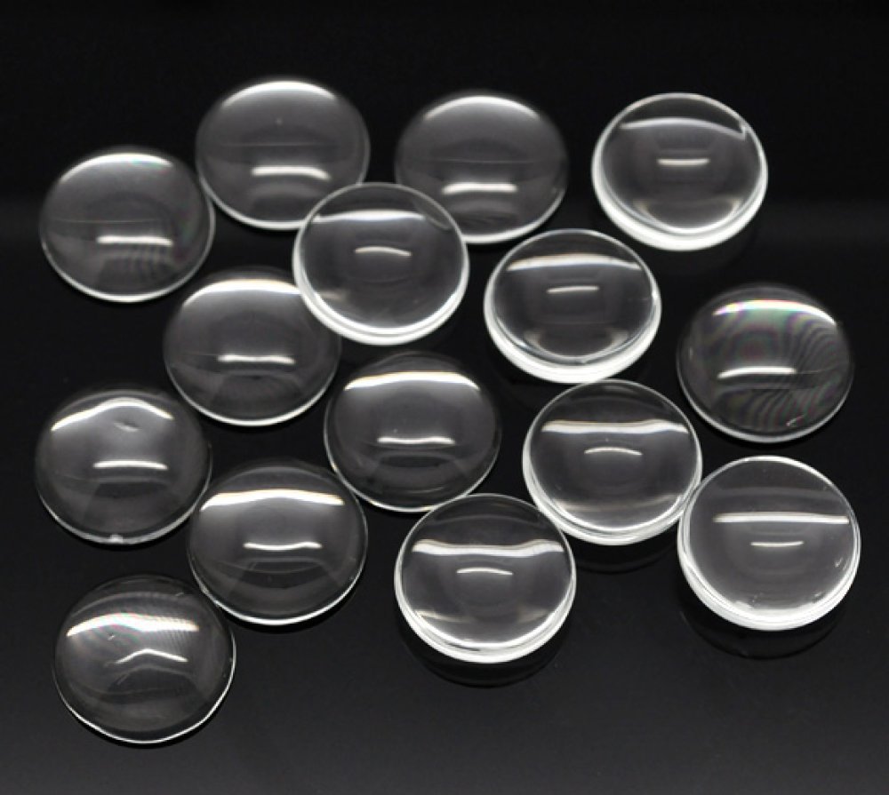 15 Cabochons runda 10 mm i klart glas N°02