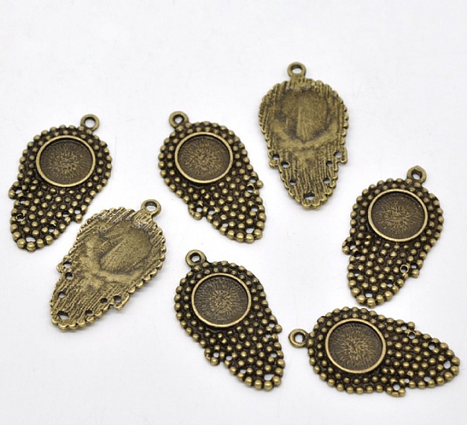 1 h&aring;llare f&ouml;r cabochon 12 mm N&deg;09 Brons