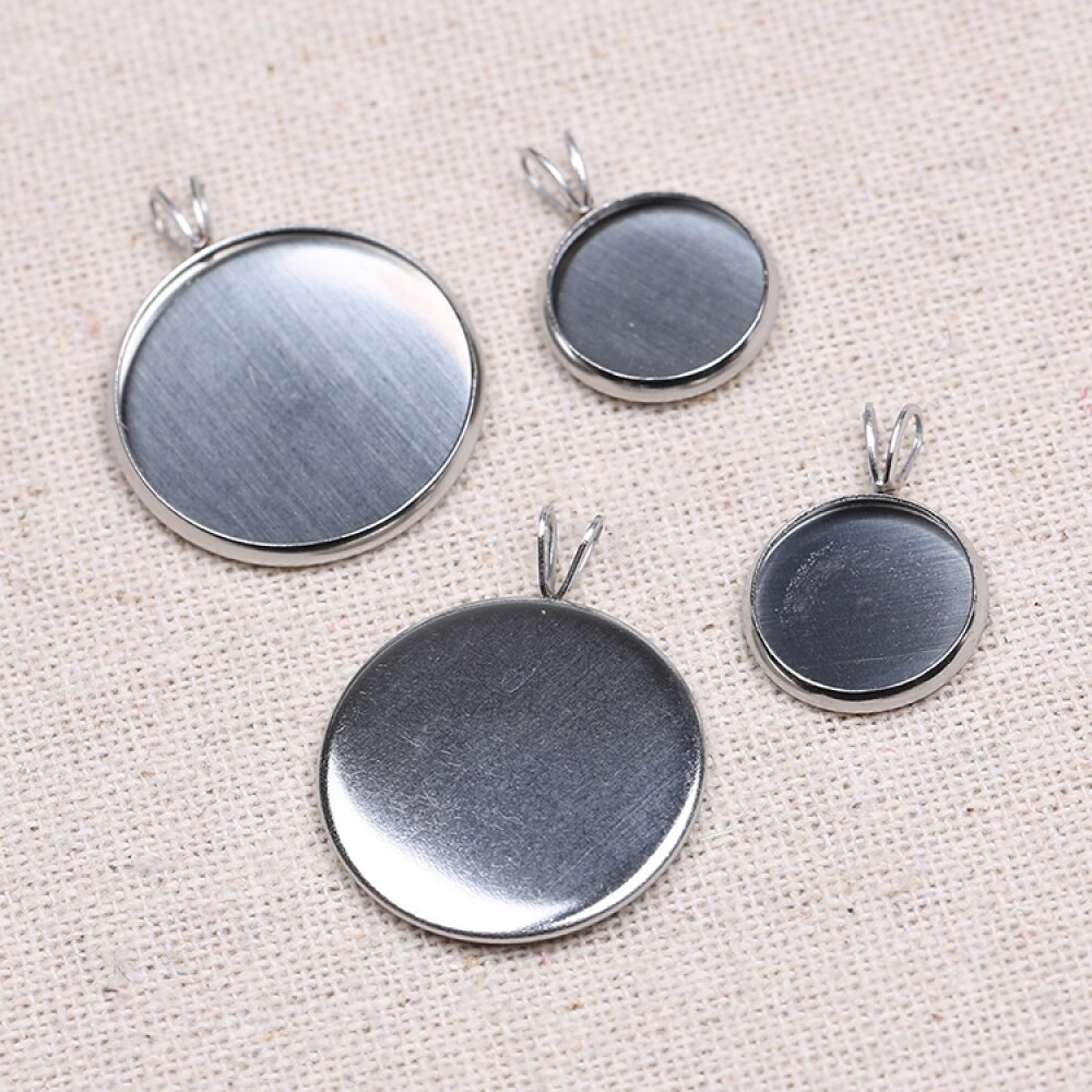 1 x 20 mm cabochonhållare i rostfritt stål N°06