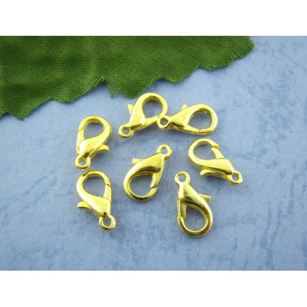20 karbinhakarspännen 12 x 07 mm guld.
