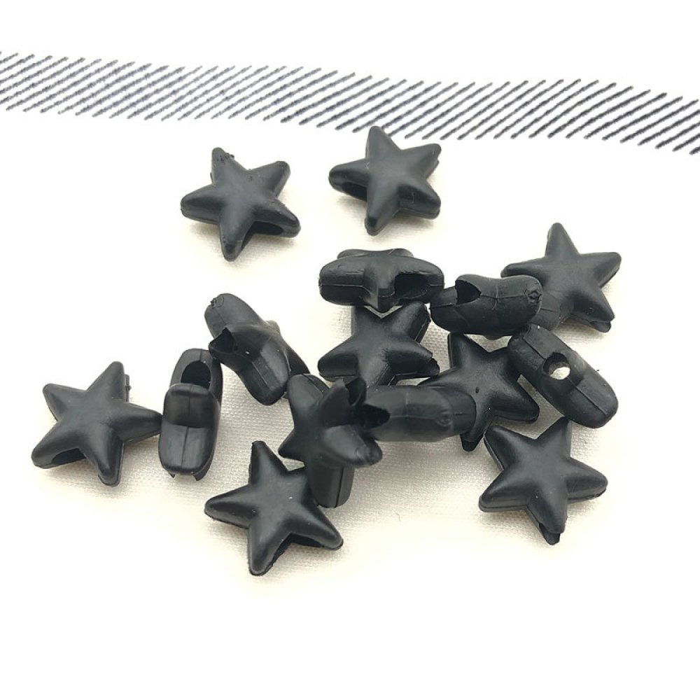 Elastiskt band med svart gummistjärnspänne N°03 x 10 st.