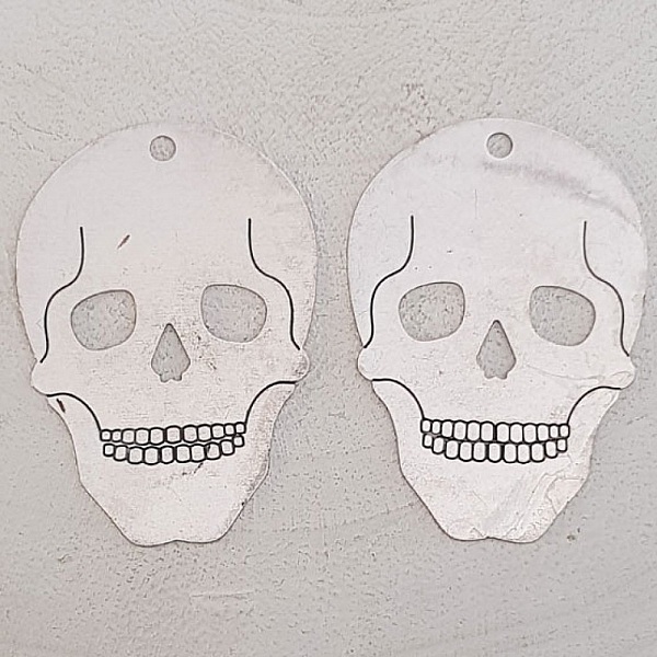 Skull och korsben charm N&deg;10