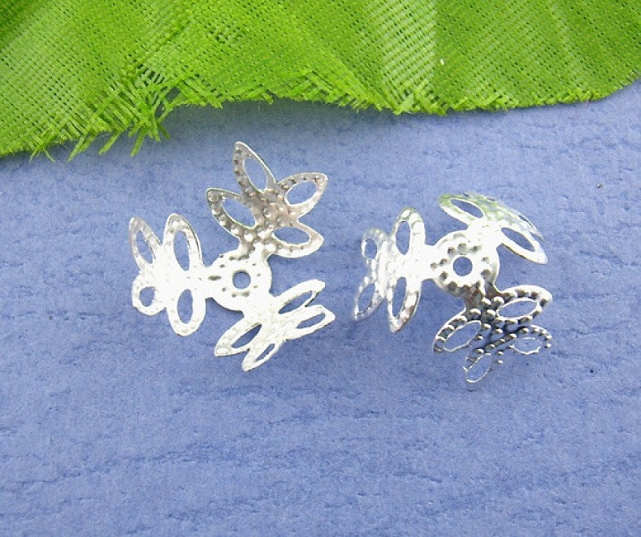 Vattenm&auml;rkt silverblomma i legering sk&aring;l x 300