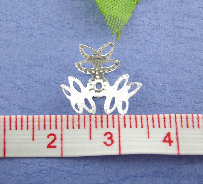 Vattenm&auml;rkt silverblomma i legering sk&aring;l x 300