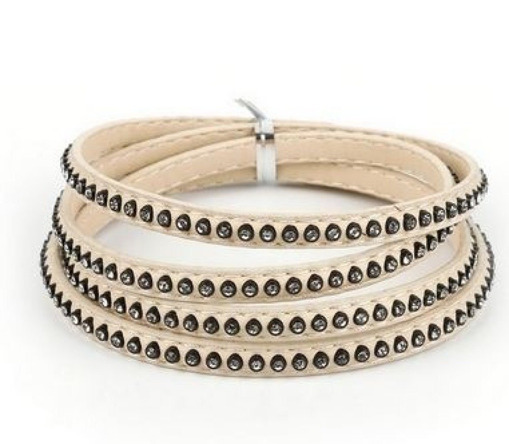 Läder 06 mm elfenbensfärgat inläggningar med strass 1 meter