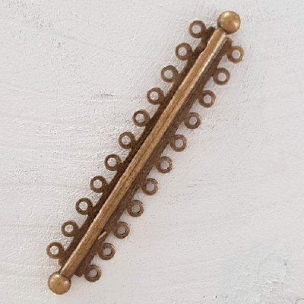 Brons Multi-Rank Clasp.