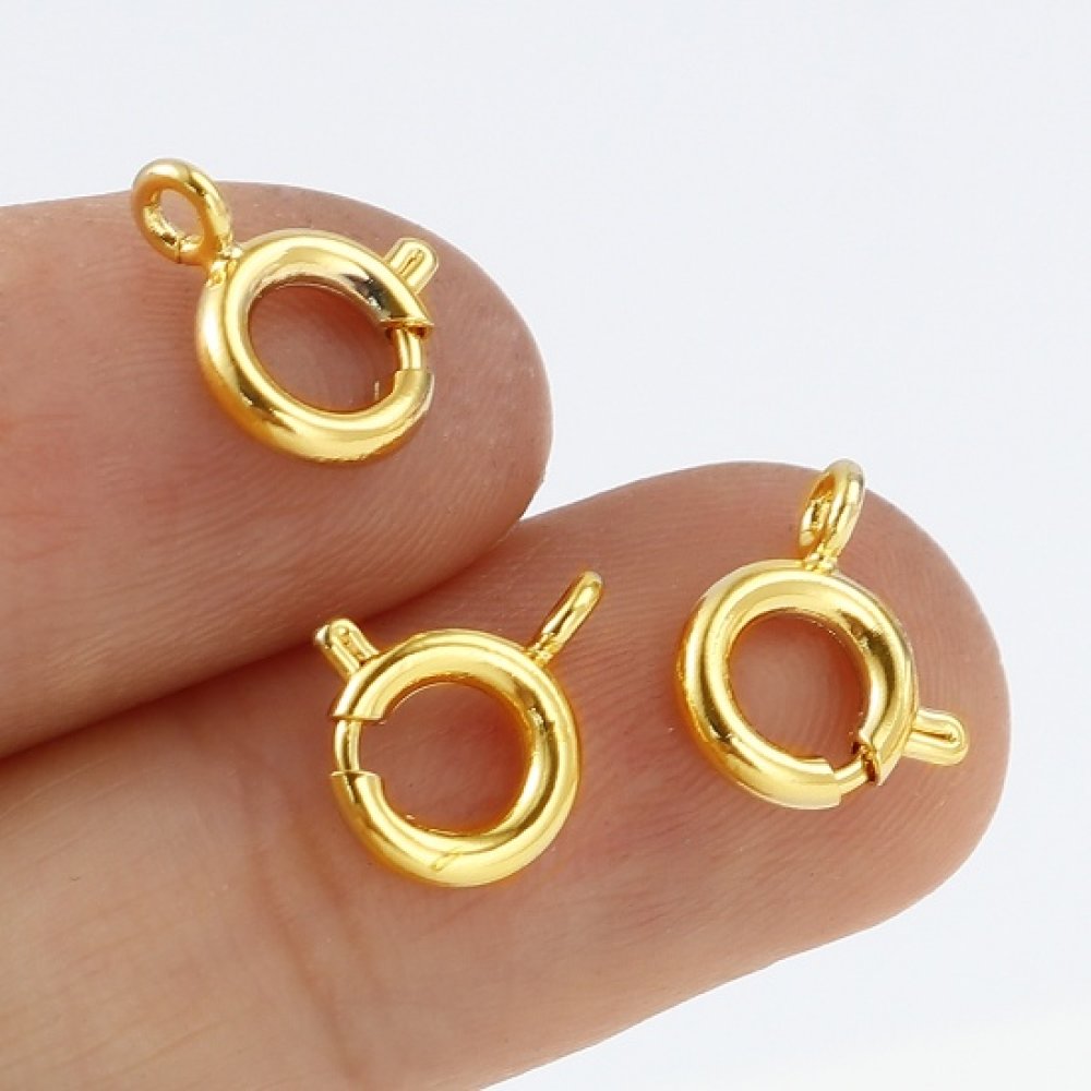 Guldpläterat runt fjäderlås N°01 Guld
