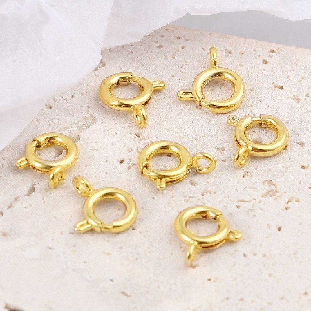 Guldpläterat runt fjäderlås N°01 Guld