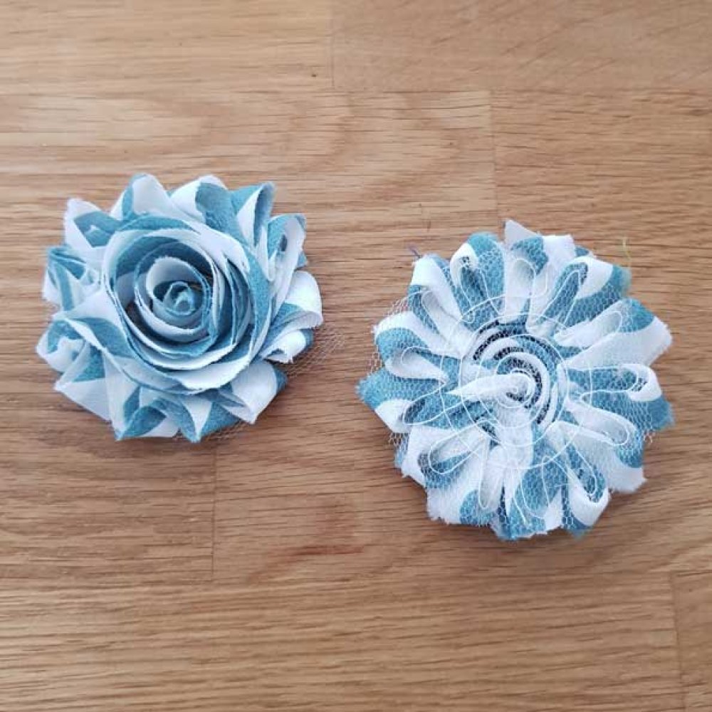 Blomma av fransigt tyg nr 69