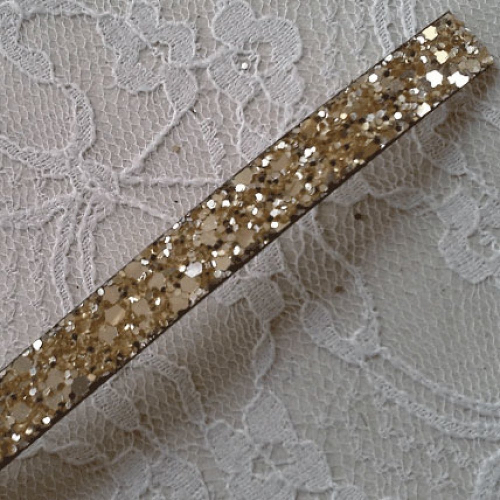 10 mm guldglitterband med läderfoder per 20 cm