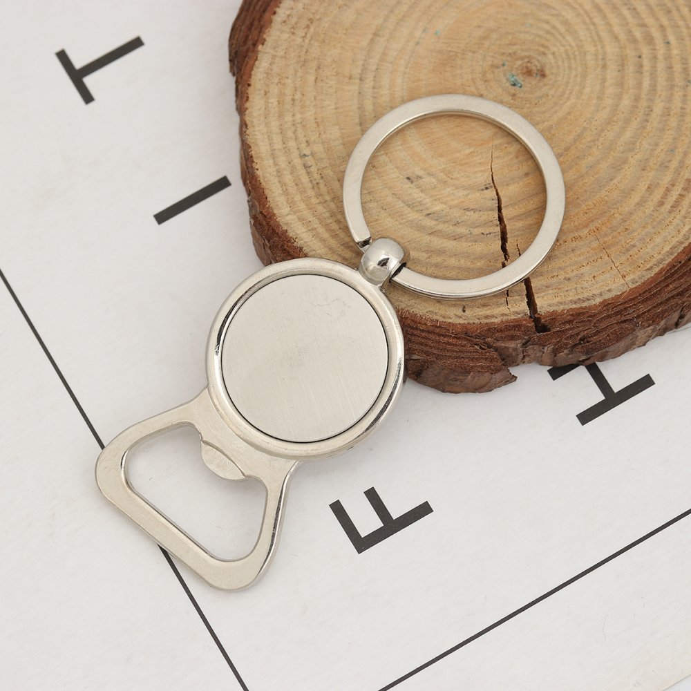 Set med 10 nyckelringar i silver 25 mm N°01
