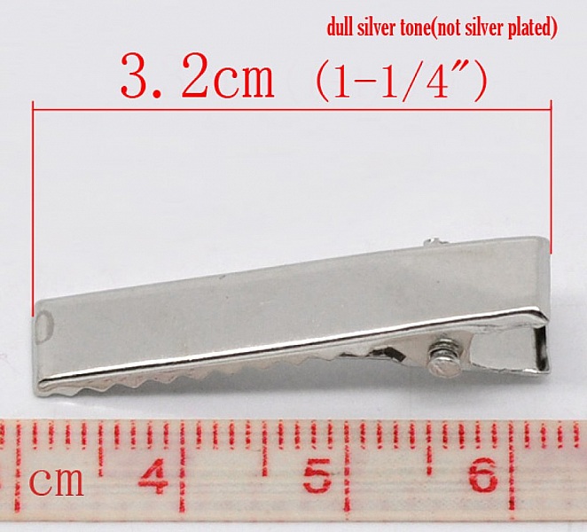 Set med 10 krokodilkl&auml;mmor - Silverf&auml;rg 32 mm x 7 mm.