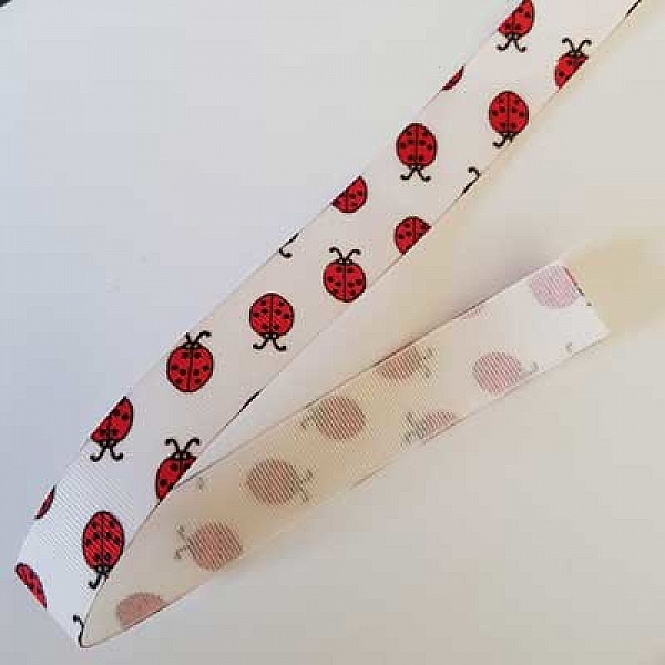 Ruban gros grain coccinelle rouge fond blanc N&deg;01 de 22 mm au m&egrave;tre