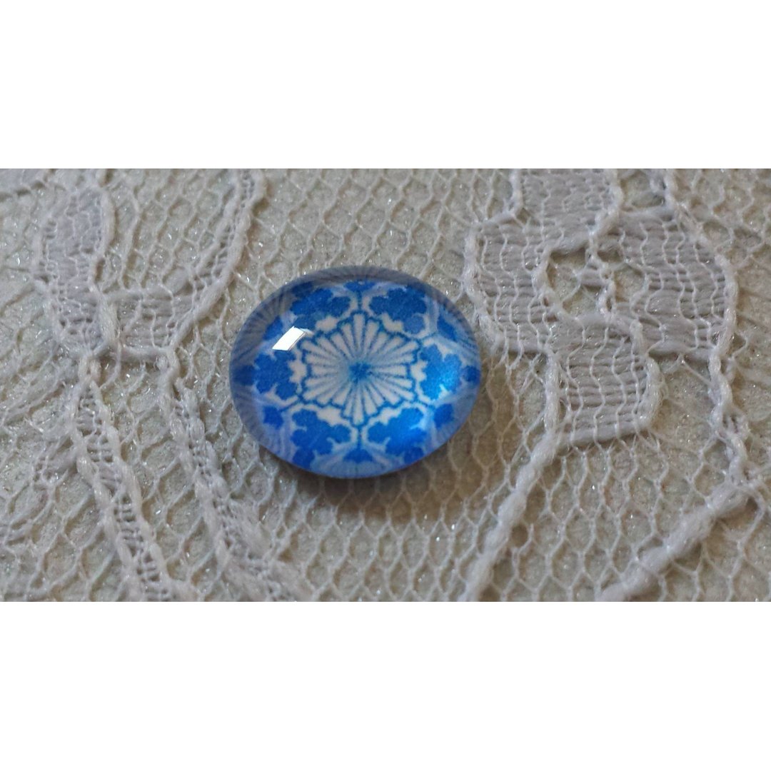 glas cabochon rund 12mm blå blomma 031 