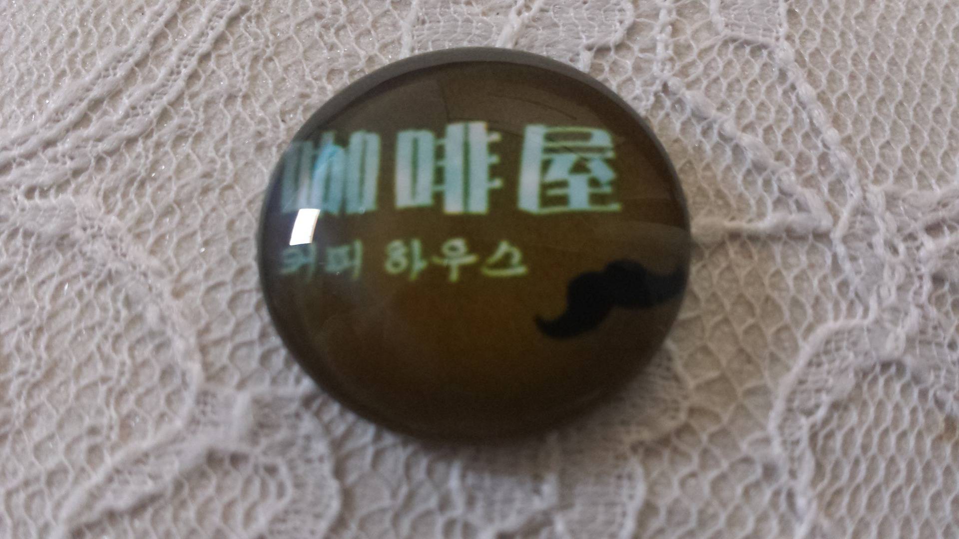 glas cabochon rund 25mm mustasch 042 