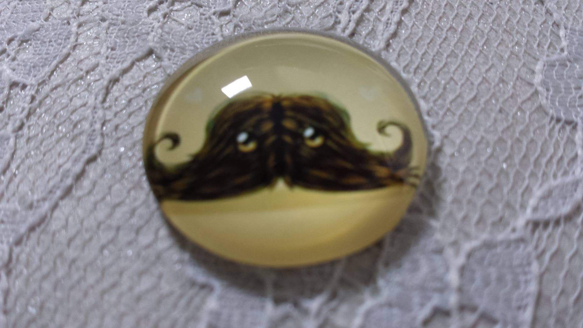 glas cabochon rund 25mm mustasch 032 