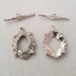 5 vridspännen med runt mönster i silver N°08