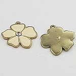 Emaljerad metallblomma 25 mm elfenben