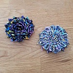 Blommor av fransigt tyg nr 64