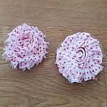 Blomma av fransigt tyg nr 76