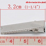 Set med 20 krokodilklämmor - Silverfärg 32 mm x 7 mm.