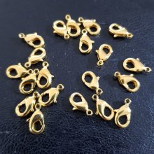 20 karbinhakarspännen 12 x 07 mm guld.