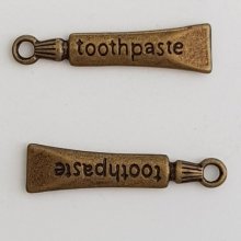 Tandkräm tub charm brons