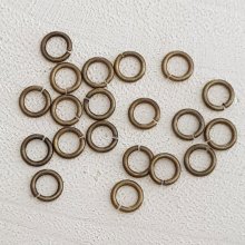 20 öppna förbindningsringar 06 mm gammalt guld