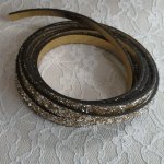 10 mm guldglitterband med läderfoder per 20 cm