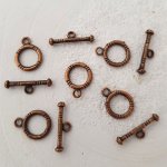 5 vridspännen med runt mönster i brons N°02
