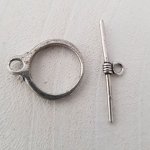 5 vridspännen med runt mönster i silver N°14