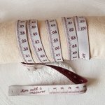 Centimeter vävt band