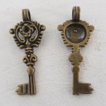 Nyckel charm N°11 brons