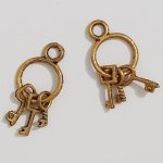 Nyckel charm N°01 gammalt guld