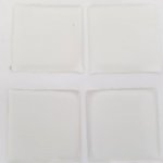 4 självhäftande Cabochons i harts 25 x 25 mm Transparent