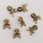 Skull och korsben charm N°22