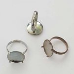 Justerbart ringstöd med 4 klor silver N°03
