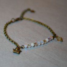 Armband i vit och guld med fin kedja