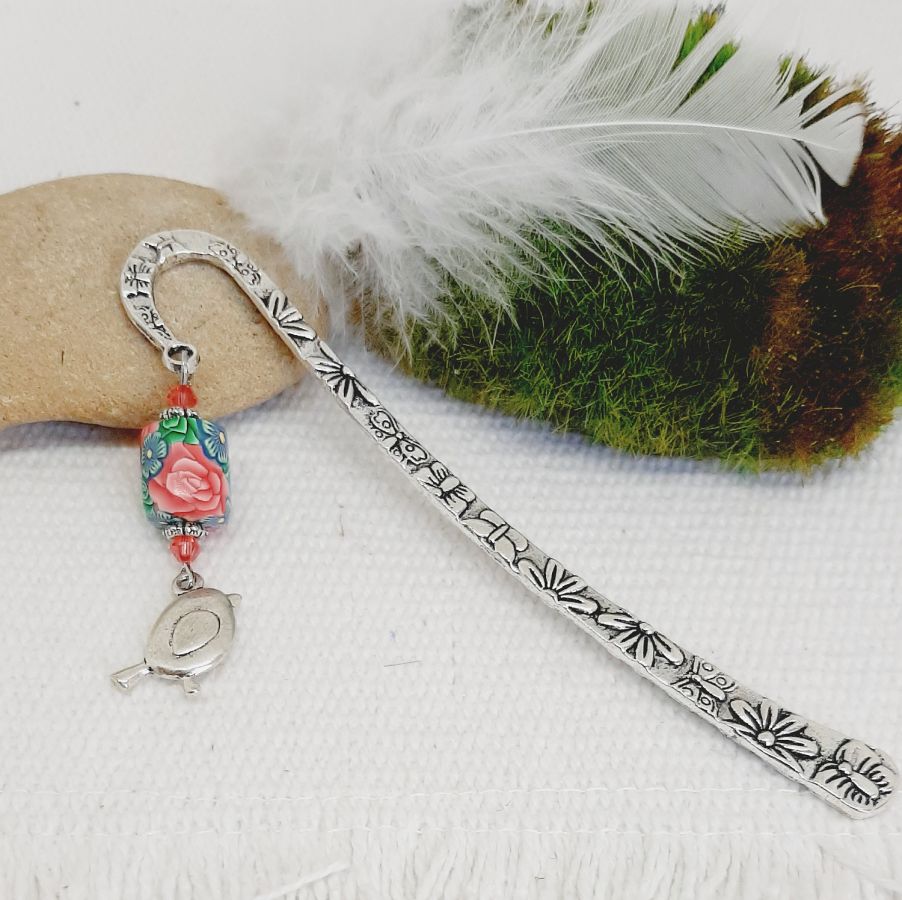 sidmarkerare pendenitf plump silver fågel och original pärlrör med sublim rosmönster