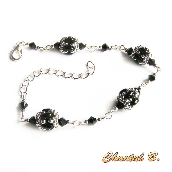 armband kristall swarovski glaspärlor svart glänsande och silver vävda