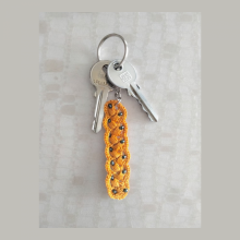 Raffinerad nyckelring 'Golden senap