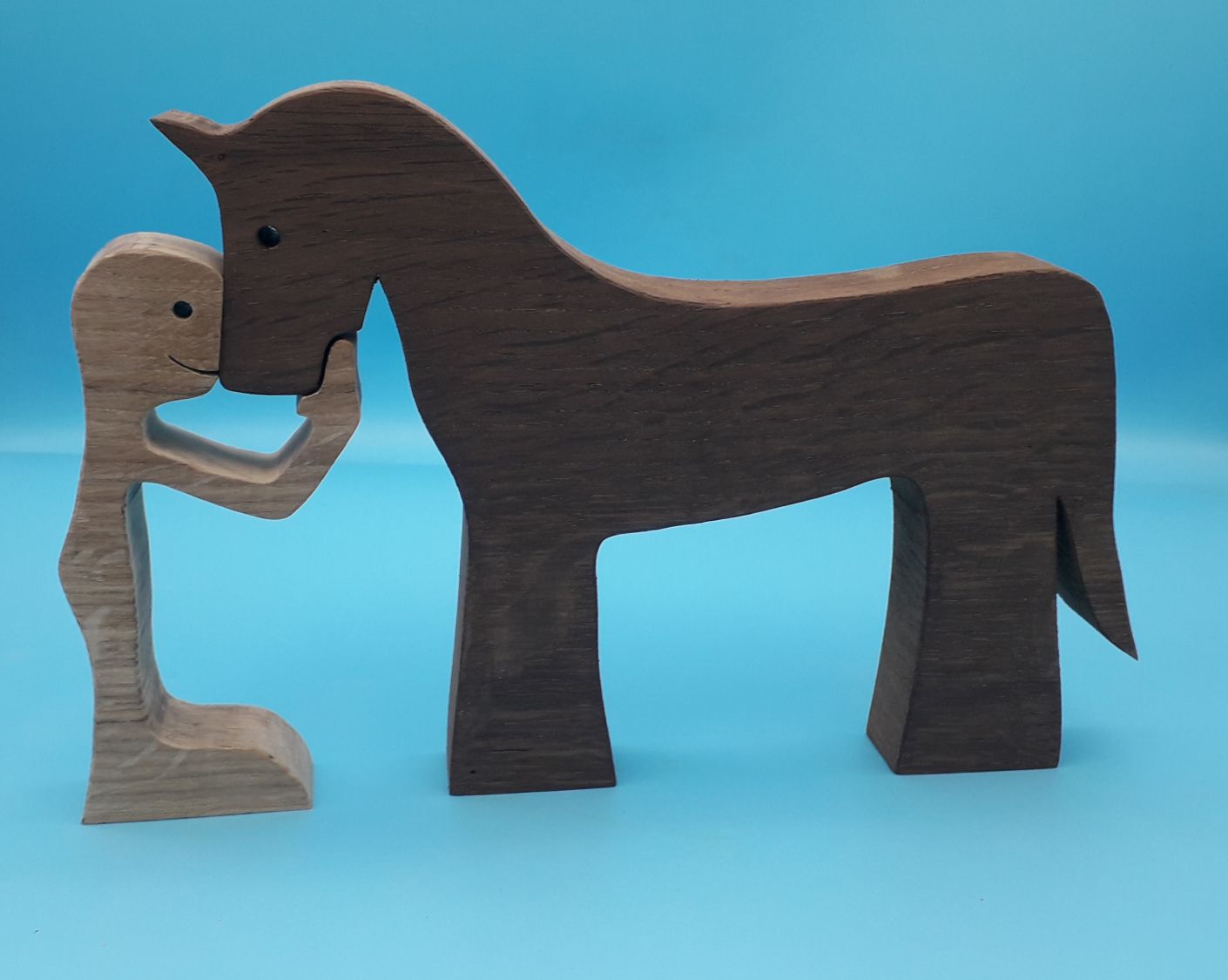 Man och hans häst träfigur