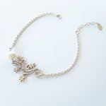 Kulturpärlor och geiko armband på 925 silverkedja
