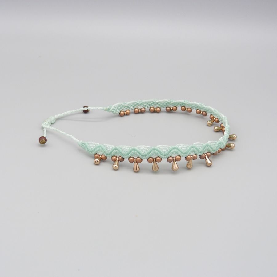 Fotledsring i micro-macramé "water mint green".