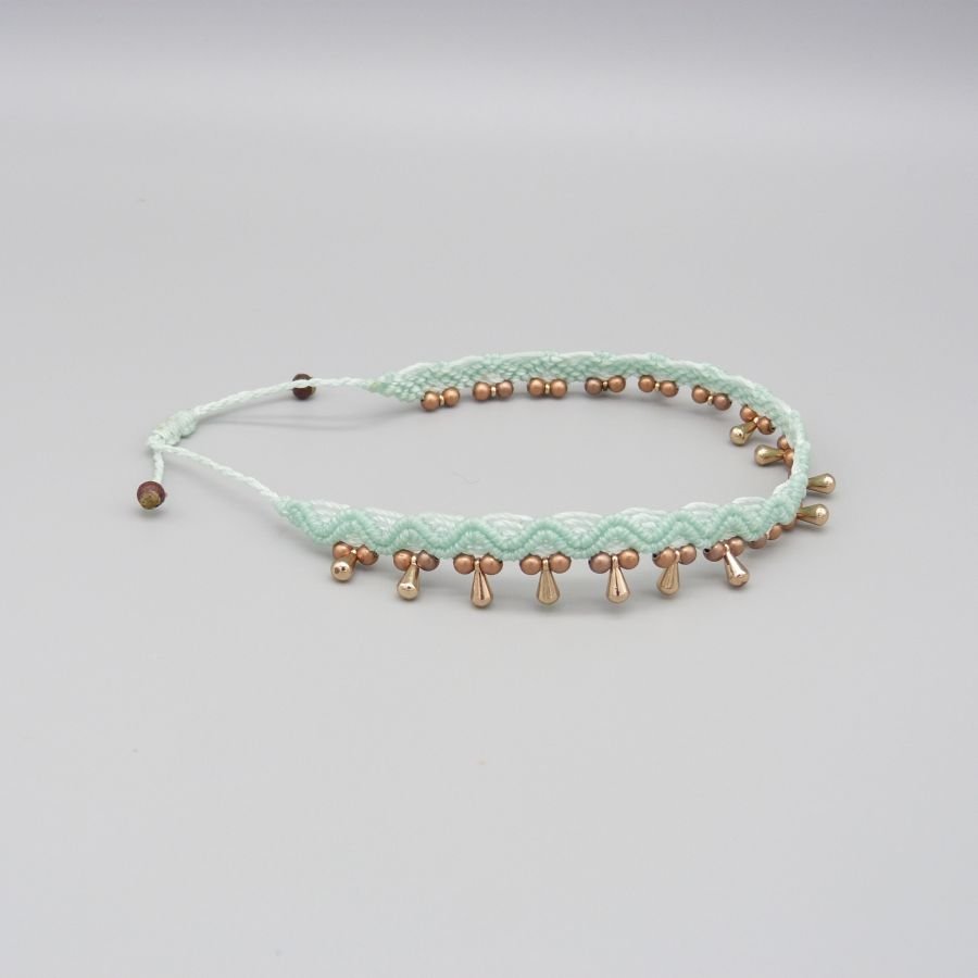 Fotledsring i micro-macramé "water mint green".