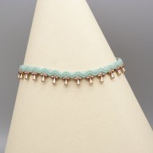 Fotledsring i micro-macramé 'water mint green'.